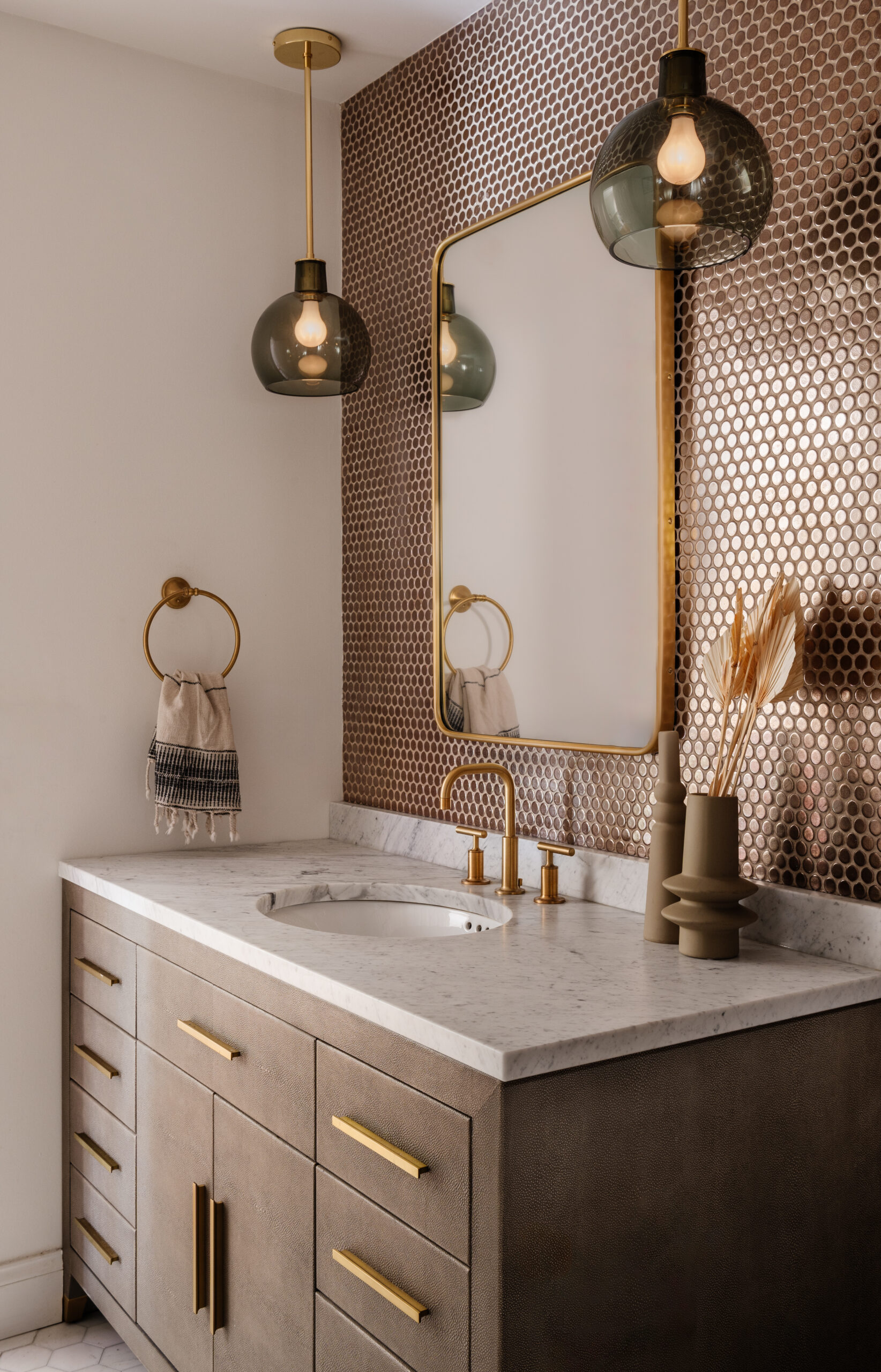 Modern bathroom with gold accents